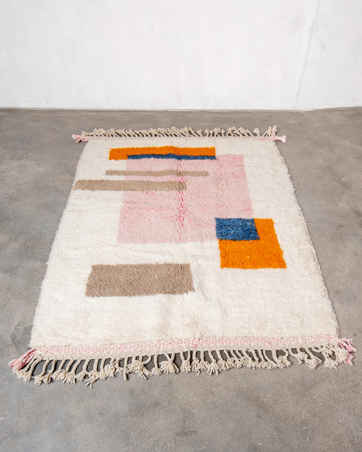 Modern, designer, handcrafted Berber runner rug from Morocco. Beniourain carpet with beautiful colours and patterns and fluffy wool texture.